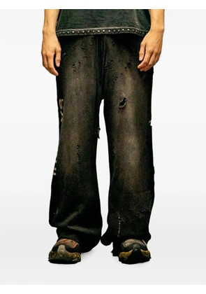 SATOSHI NAKAMOTO Luke distressed-effect wide-leg track pants - Black