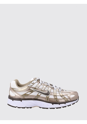 NIKE Sneakers Woman color Gold