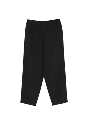 Issey Miyake Men elasticated-waistband trousers - Black