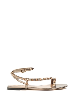Valentino Garavani Rockstud laminated nappa sandals - Gold
