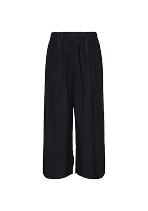 Issey Miyake Men elasticated pleated trousers - Black