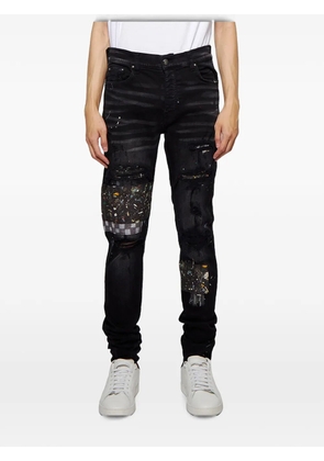 AMIRI paint-splatter patched jeans - Black