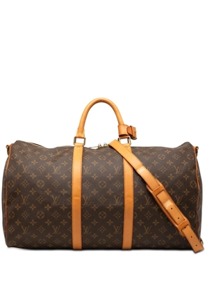 Louis Vuitton Pre-Owned 2009 Monogram Keepall Bandouliere 50 travel bag - Brown