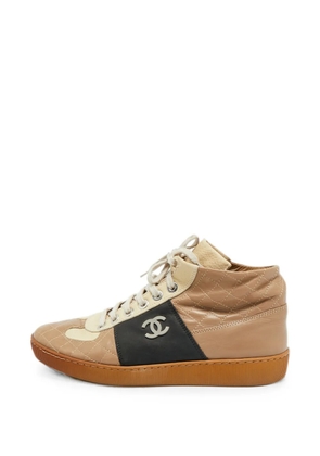 CHANEL Pre-Owned CC quilted high-top sneakers - Neutrals