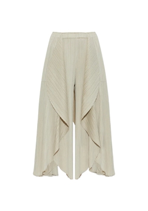 Pleats Please Issey Miyake Leaf pleated draped-design trousers - Neutrals