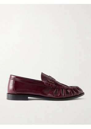 SAINT LAURENT - Le Loafer Logo-embellished Leather Penny Loafers - Burgundy - EU 34,EU 34.5,EU 35,EU 35.5,EU 36,EU 36.5,EU 37,EU 37.5,EU 38,EU 38.5,EU 39,EU 39.5,EU 40,EU 40.5,EU 41,EU 41.5,EU 42