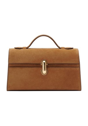 Symmetry suede clutch bag
