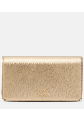 Valentino Garavani VLogo Mini metallic leather clutch