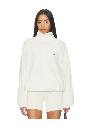 NikeSKIMS Stretch Nylon Jacket in Ivory. Size XXS. Also in XS, S, M, L, XL.