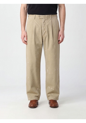 AURALEE Pants Men color Beige