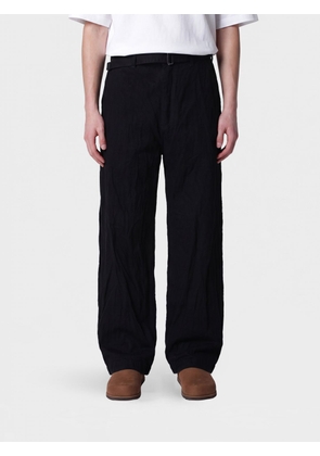 STUDIO NICHOLSON Jeans Men color Black