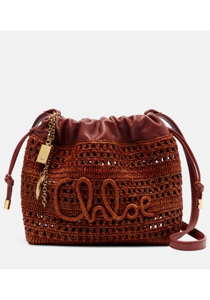 Chloe Mini leather-trimmed raffia bucket bag