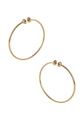 Jenny Bird Medium Icon Hoops in Metallic Gold.