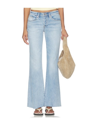Good American Vintage Low Rise Relaxed Flare Jeans in Blue. Size 00. Also in 0, 2, 4, 6, 8, 10, 12, 14.