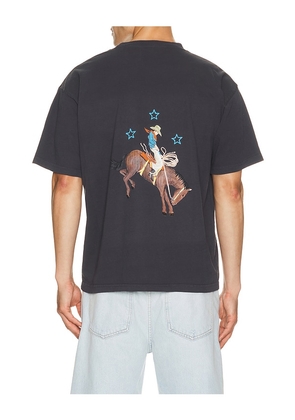 Remington Stone Cowboy 2 Tee in Black. Size S. Also in M, L, XL/1X, XXL/2X.