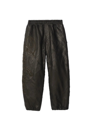 Burberry cursive-logo leather trousers - Brown