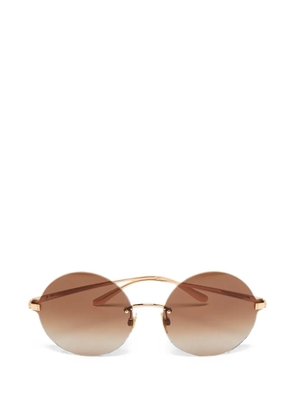 Dolce & Gabbana Pre-Owned round rimless sunglasses - Gold