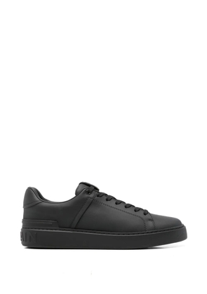 Balmain logo-embossed leather sneakers - Black