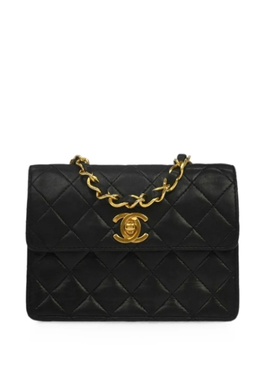 CHANEL Pre-Owned 1990 diamond-quilted CC turn-lock shoulder bag - Black