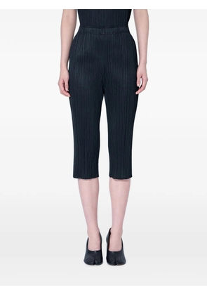 Pleats Please Issey Miyake pleated cropped trousers - Black