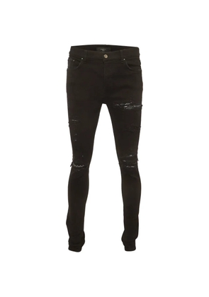 AMIRI distressed slim-fit jeans - Black
