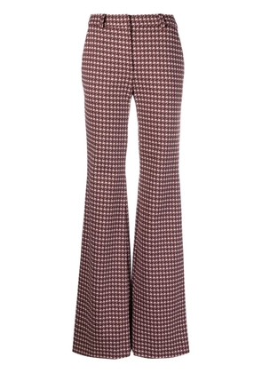 Moschino graphic-print flared trousers - Pink