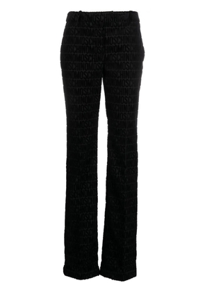 Moschino monogram-print tailored trousers - Black