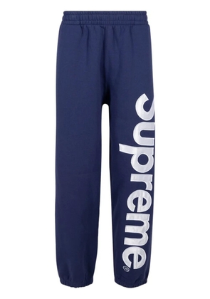Supreme satin appliqué 'FW23 - Wash Navy' track pants - Blue