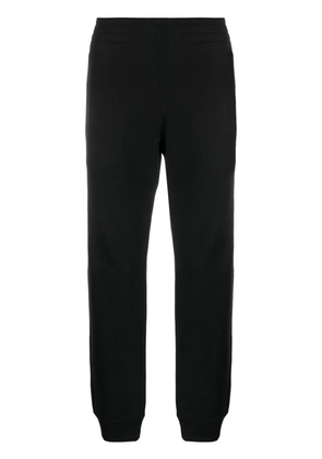 Moschino logo-patch elasticated track pants - Black