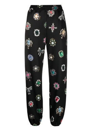 Moschino graphic-print straight-leg trousers - Black