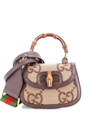 Gucci Pre-Owned Bamboo 1947 Top Handle Bag Jumbo GG Canvas Mini crossbody bag - Brown