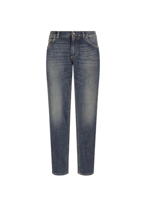 Dolce & Gabbana logo-plaque slim-cut jeans - Blue