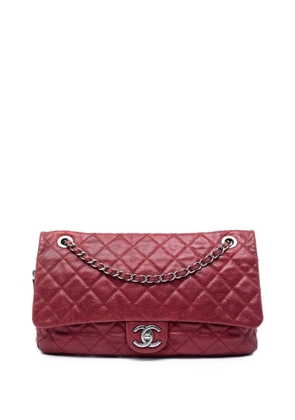 CHANEL Pre-Owned 2012 Jumbo Quilted Iridescent Caviar Easy Flap shoulder bag - Red