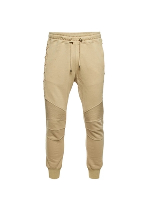 Balmain Pre-Owned rib-detailed lace-up track pants - Neutrals