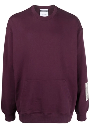 Moschino logo-patch organic cotton sweatshirt - Red