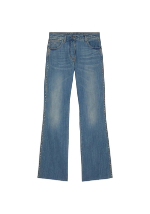 MOMONÌ Fuego stud-embellished jeans - Blue