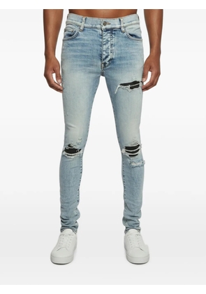 AMIRI distressed skinny jeans - Blue