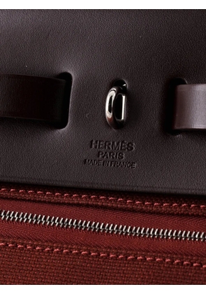 Hermès Pre-Owned Herbag Zip Criss Viking Toile and Leather 31 shoulder bag - Red