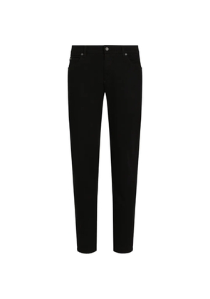 Dolce & Gabbana logo-plaque slim-fit jeans - Black