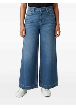 Dolce & Gabbana Pre-Owned distressed wide-leg jeans - Blue