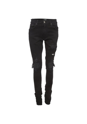 AMIRI distressed skinny jeans - Black