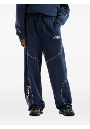 New Balance Trackside piping track pants - Blue