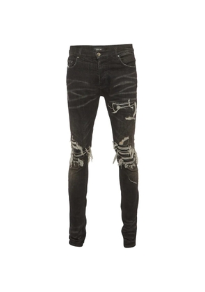 AMIRI distressed skinny jeans - Black