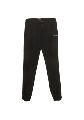 Christian Dior Pre-Owned embroidered track pants - Black