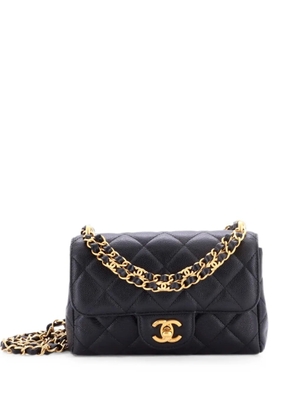 CHANEL Pre-Owned Coco First Flap Bag Quilted Caviar Nano crossbody bag - Black