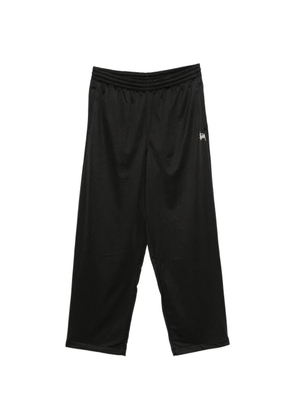 Stüssy logo-embroidered track pants - Black