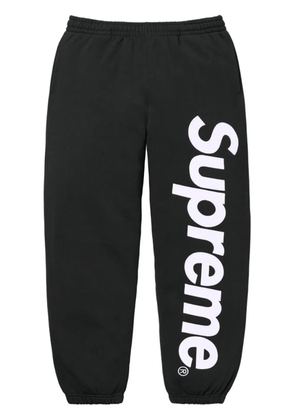 Supreme satin-appliqué cotton track pants - Black