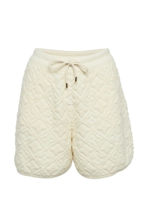 Louis Vuitton Pre-Owned monogram-embossed shorts - White