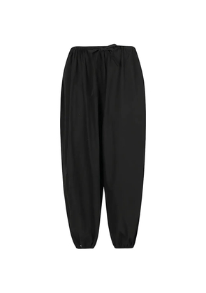 mizuiro ind tapered-leg elasticated-hem trousers - Black