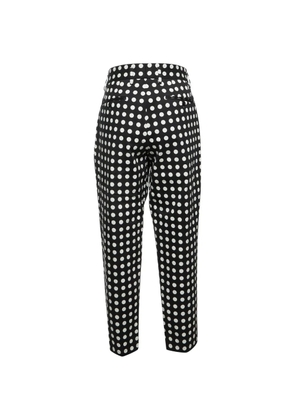 Dolce & Gabbana Pre-Owned polka dot pleated trousers - Black